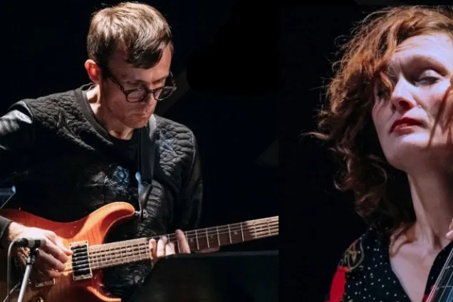 Two musicians performing. Photo.