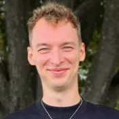 Porträttbild Philip Skog.