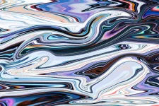 Abstrakt bild i silvertoner. Unsplash.