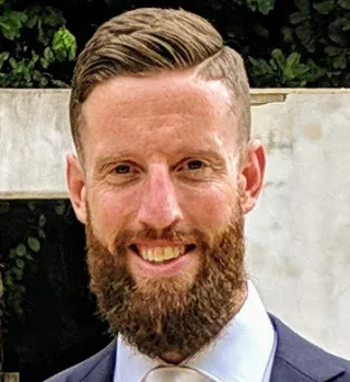 Ett porträtt av en man, Murray Scown. Bild.